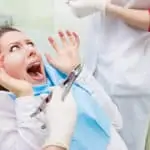 woman afraid of dentist